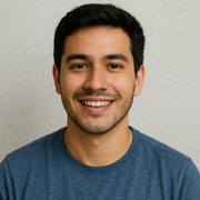 Robotime blog author headshot of Daniel Rivera, a smiling young man with dark hair wearing a blue t-shirt against a light gray background