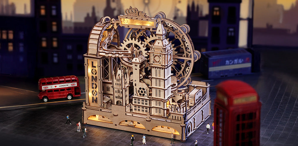ROKR mechanical 3D puzzle vintage clock model dark atmospheric photo with blurred foreground showing London Big Ben style design