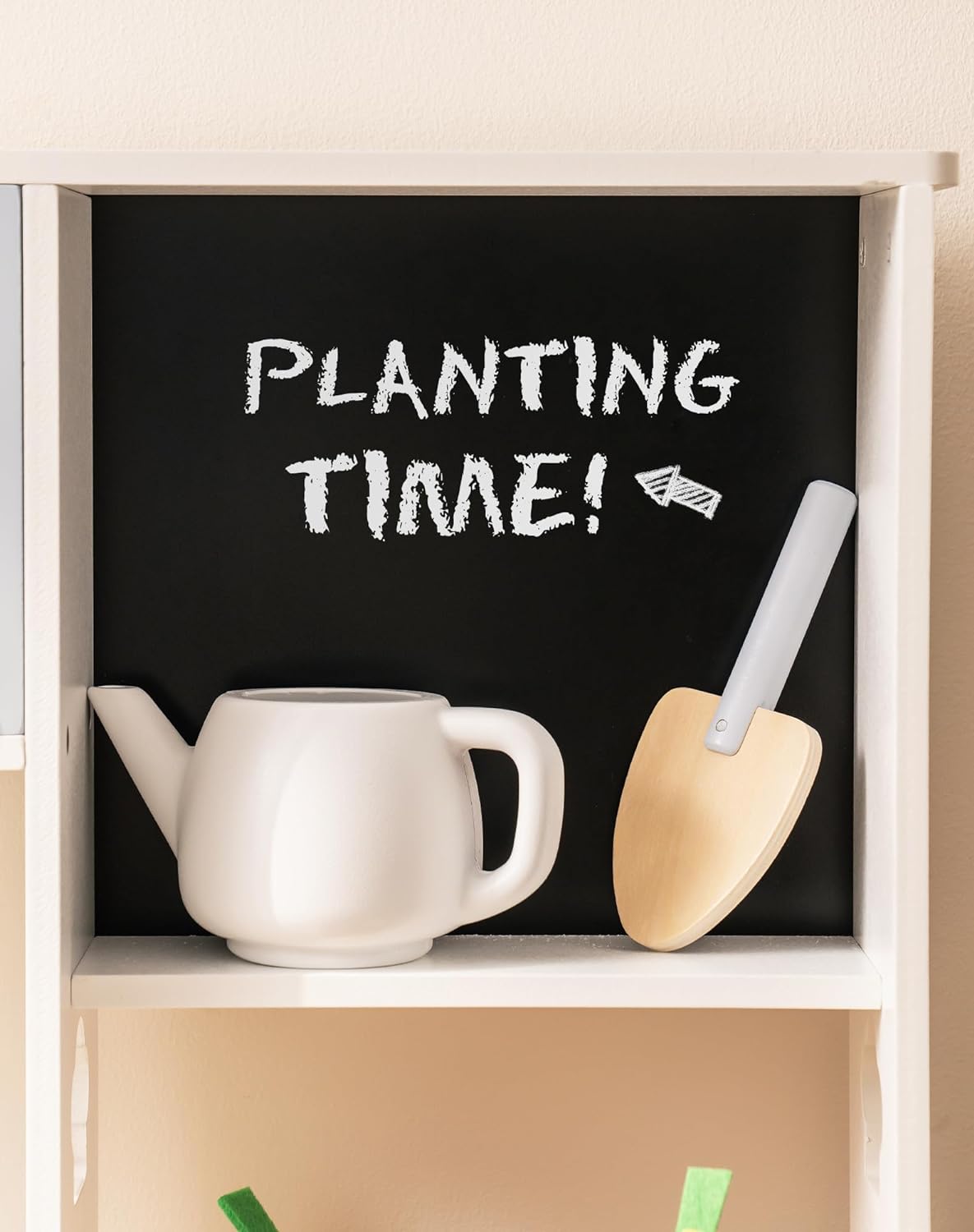 Robud play kitchen chalkboard section with watering can and trowel illustration reading Planting Time