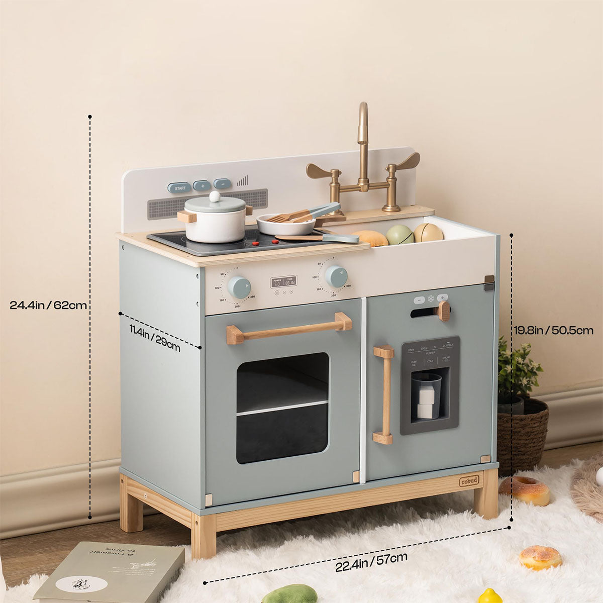 ROBUD WCF27 blue-grey play kitchen with dimension annotations in a bright living room setting.