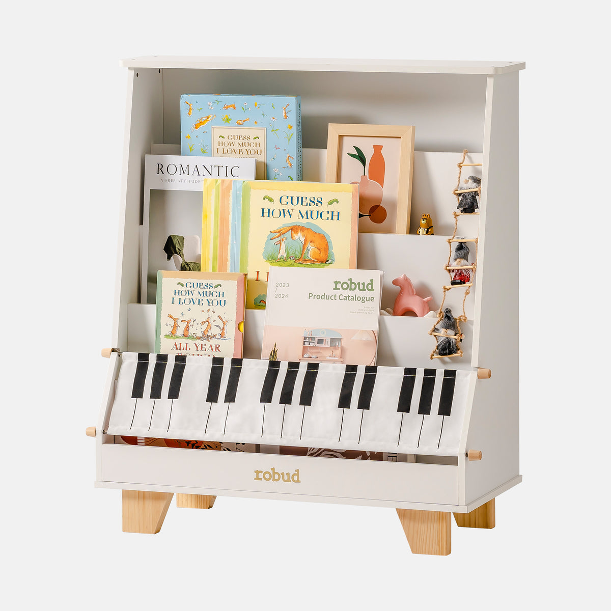 ROBUD Wooden Kids Bookshelf Piano WF009 green version full front view showing dark olive green painted MDF body with piano key fabric bag, tiered shelves with colorful books and natural pine legs