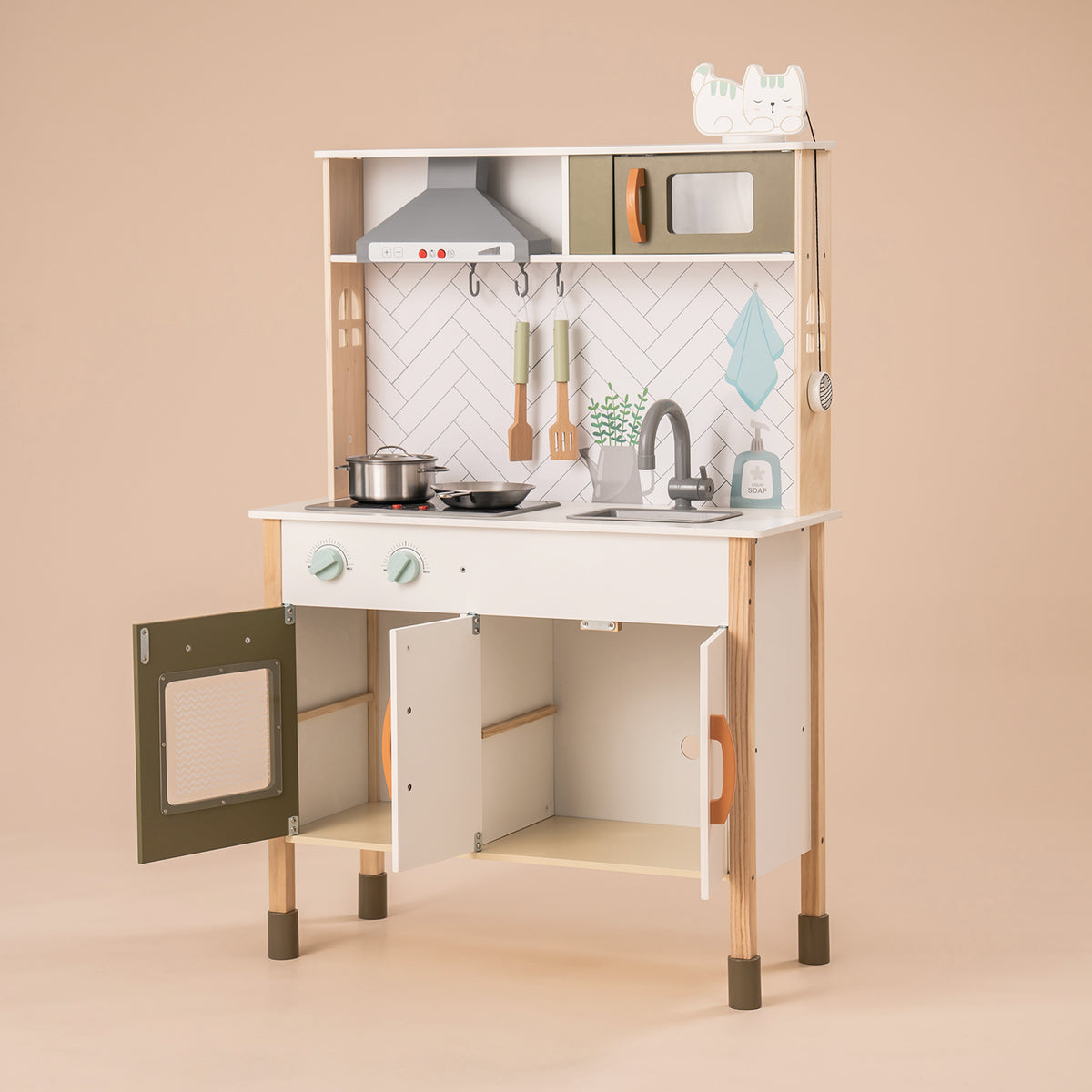 ROBUD wooden play kitchen for toddlers WG187 front view in white with crown detail, open door and utensils on display