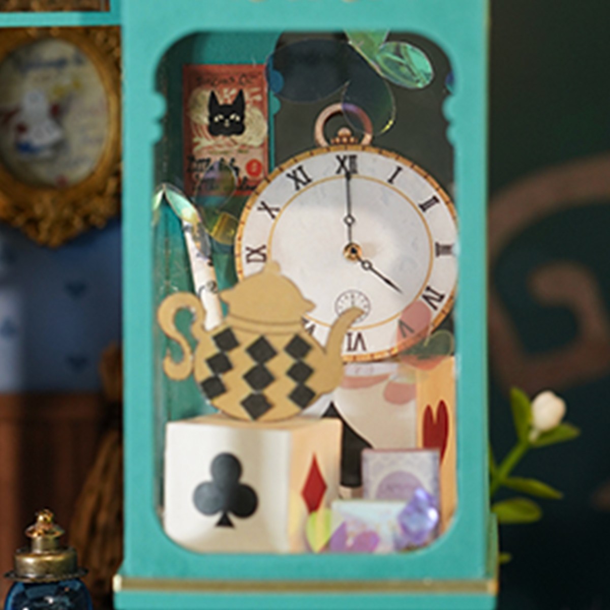 Rolife Alice's Tea Store teal nook interior with a large clock face, checkered teapot, playing card suits and potion bottles
