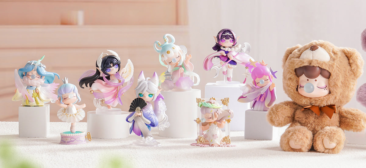 Collection of Rolife pastel figure dolls in fantasy and animal costumes displayed on pedestals against a soft lavender background