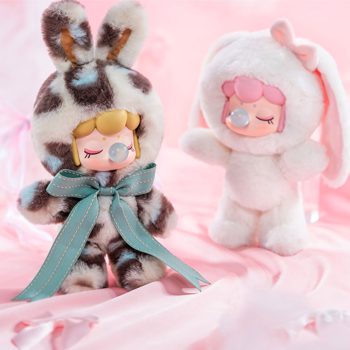 Rolife Nanci Shining Bunny MNBXX collection close-up showing multiple plush doll faces with bubble-gum noses and soft fur hoods together.